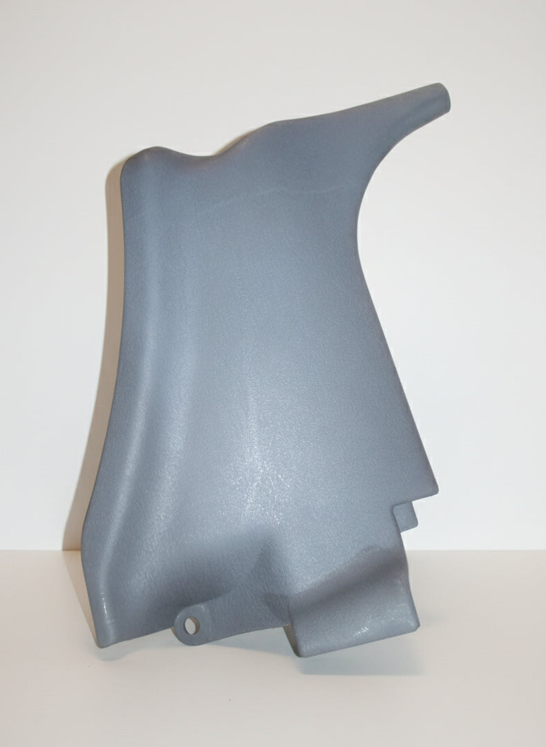 Gray plastic car part on a white background