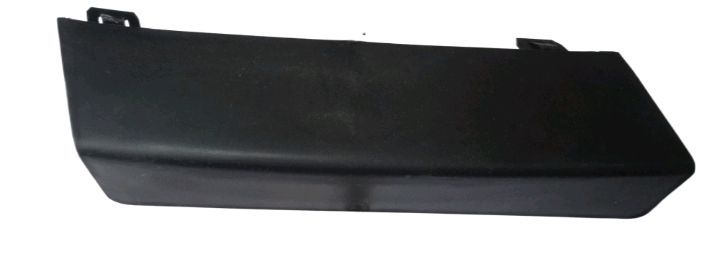 Black plastic car panel on a white background