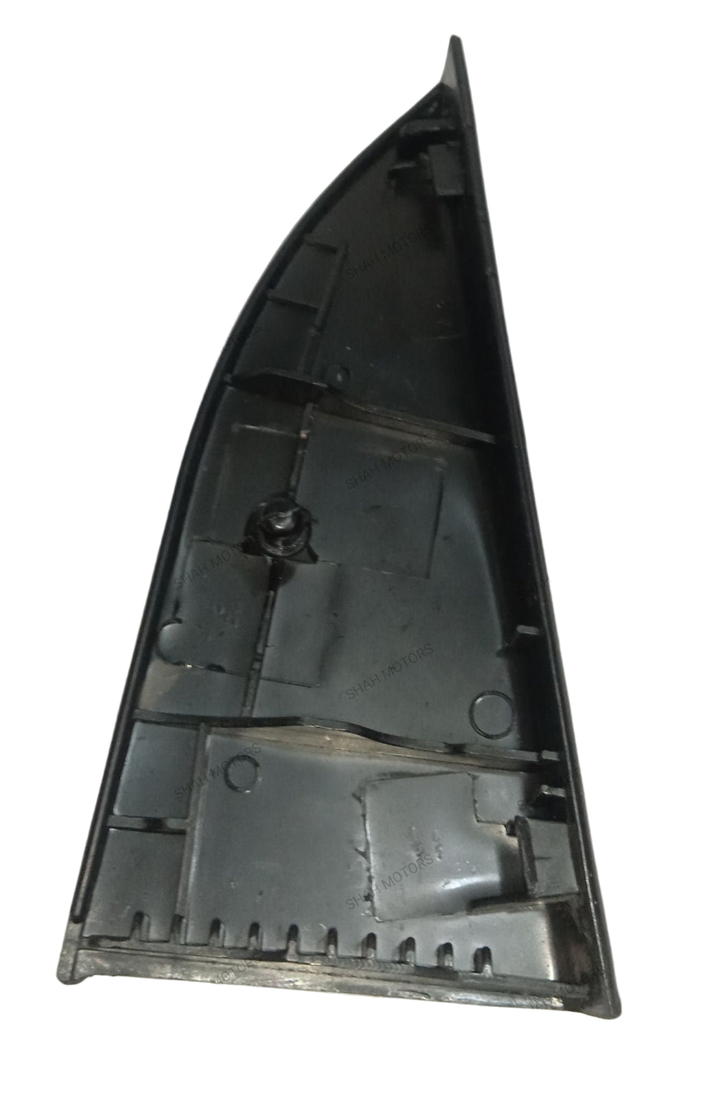 Black plastic component on a white background