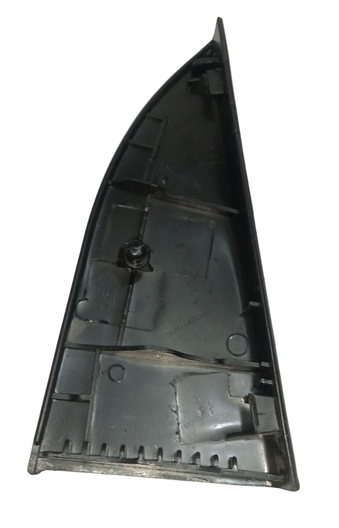 Black plastic component on a white background