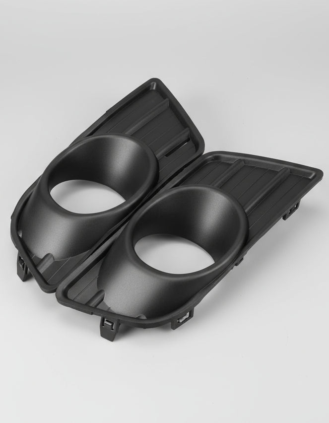 Black car cup holder with two compartments on a white background
