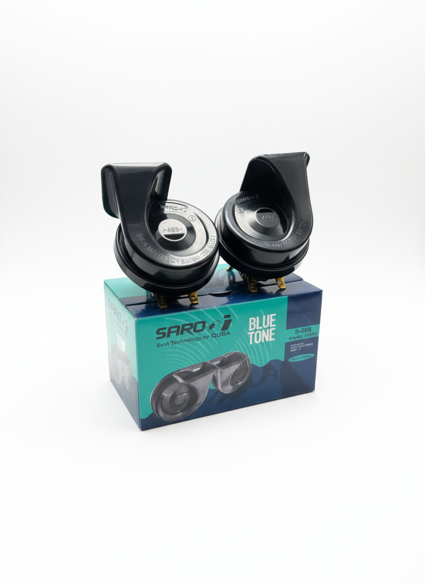 Two black horns on a blue SARD box with 'Blue Tone' text on a wooden surface.