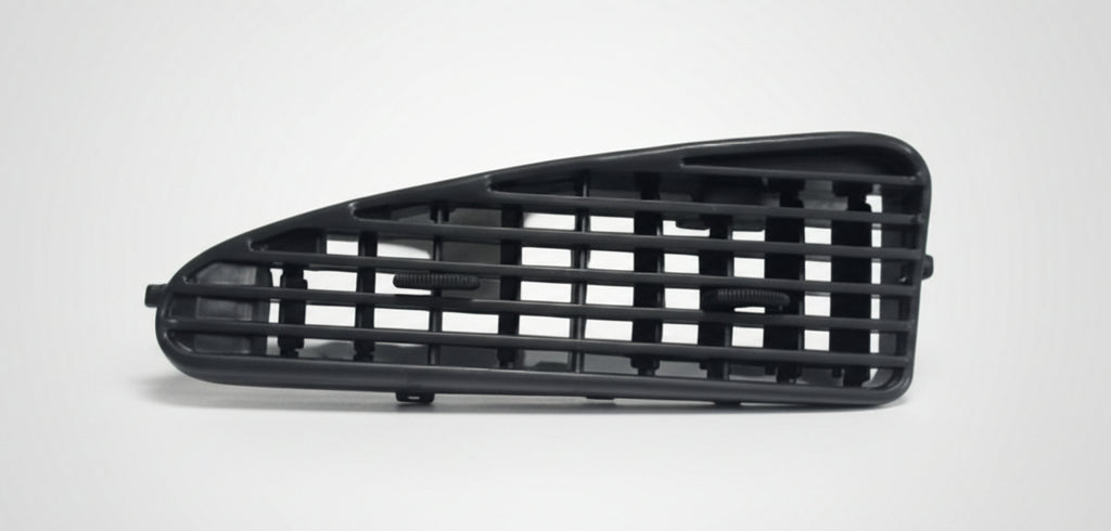 Black car grille on a white and gray checkered background