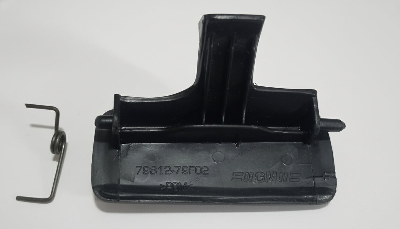 Black automotive part on a light gray background