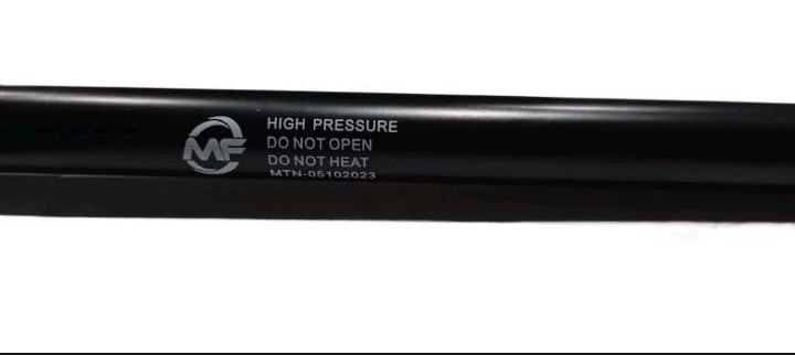 Black high-pressure hose with visible branding on a white background