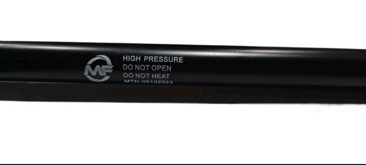Black high-pressure hose with visible branding on a black background