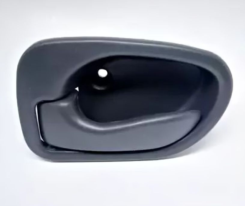 Gray car interior door handle on a white background