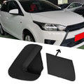 Car with a black car fender splash guard and a white car in the background