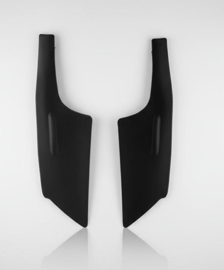 Two black car mud flaps on a white background with a blue car for scale.