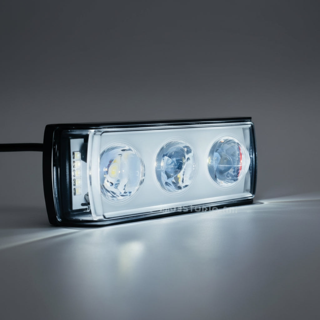 LED light bar with blue and white lights on a dark background