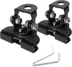 Two black metal brackets with a small metal bar on a white background