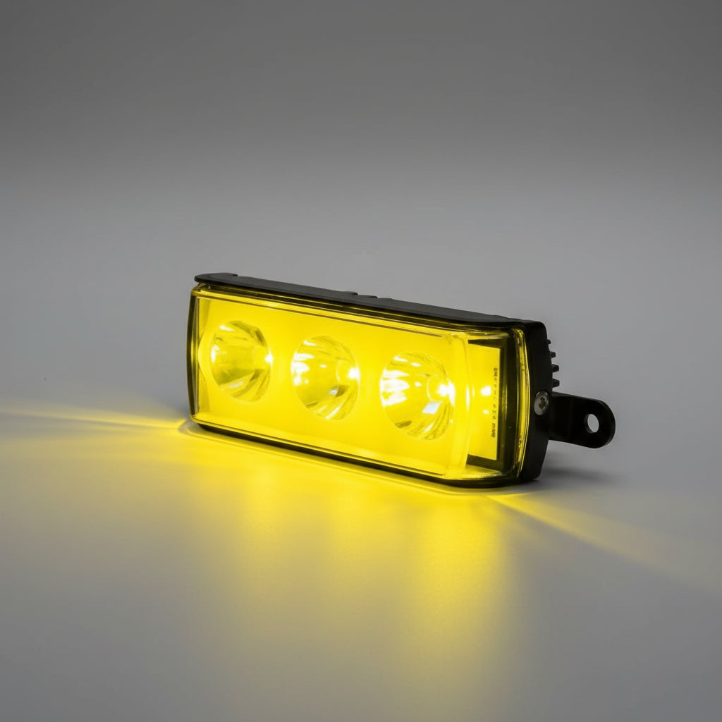 Yellow LED light module on a dark background