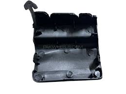 Black plastic component with 'AXYS' branding on a white background