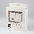 White car charger in packaging on a white background
