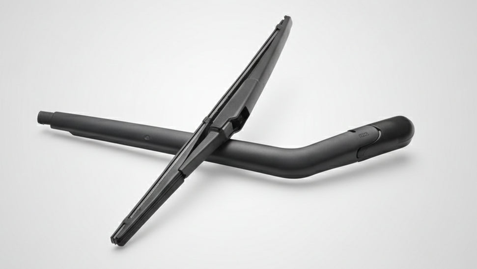 Two black car wiper blades on a white background