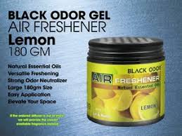 Black Odor Gel Air Freshener container with lemon scent on a blue background