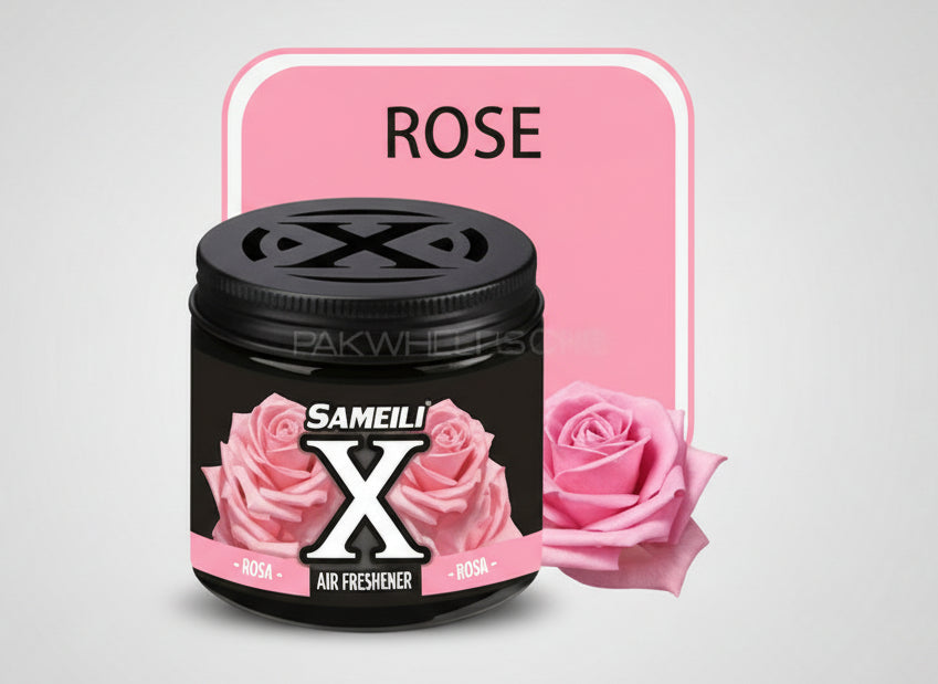 Black air freshener jar with pink roses and 'X' logo on a white background