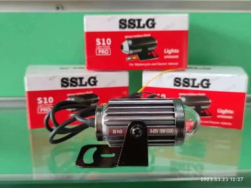 Motorcycle light with SSLG packaging on a green background